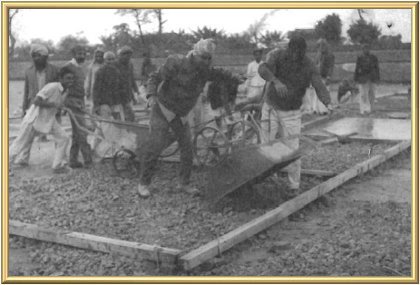 The huge quantities of concrete were prepared in a mixer and poured in sections.