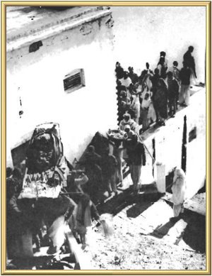 The funeral procession leaves the Ashram.