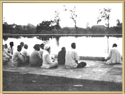 The Master with His children at the Pool of Immortality (Mansarovar) at Manav Kendra.