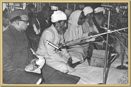 Some of the speakers at the afternoon Satsang. From left: Mr M.M. Copra; Maharaj Jagjit Singh; Swami Govindananda, with harmonium; Swami Arvindananda; the Master; Bey Sahib, a Muslim clergyman.