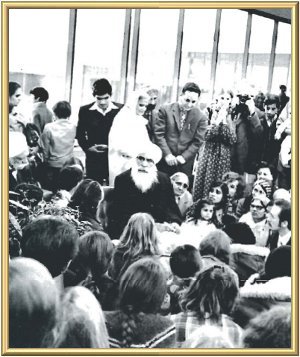 The Master sitting with His children at the airport in Vancouver, just prior to His departure for San Francisco, on 11th November.